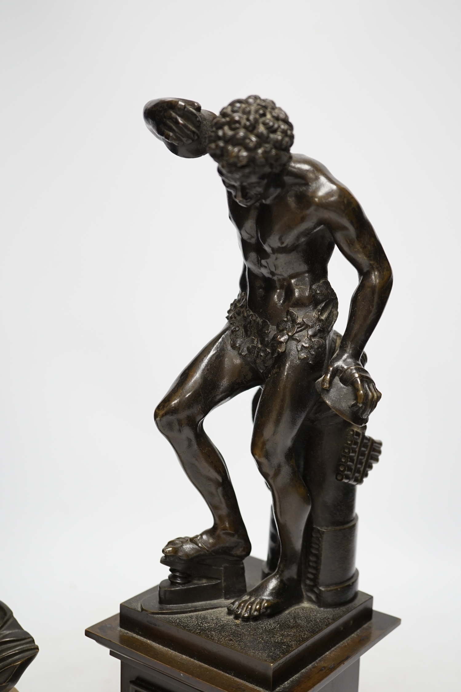 After Isaak Duchemin, a bronze figure of Pan, together with a bust of Apollo, tallest 37cm. Condition - fair